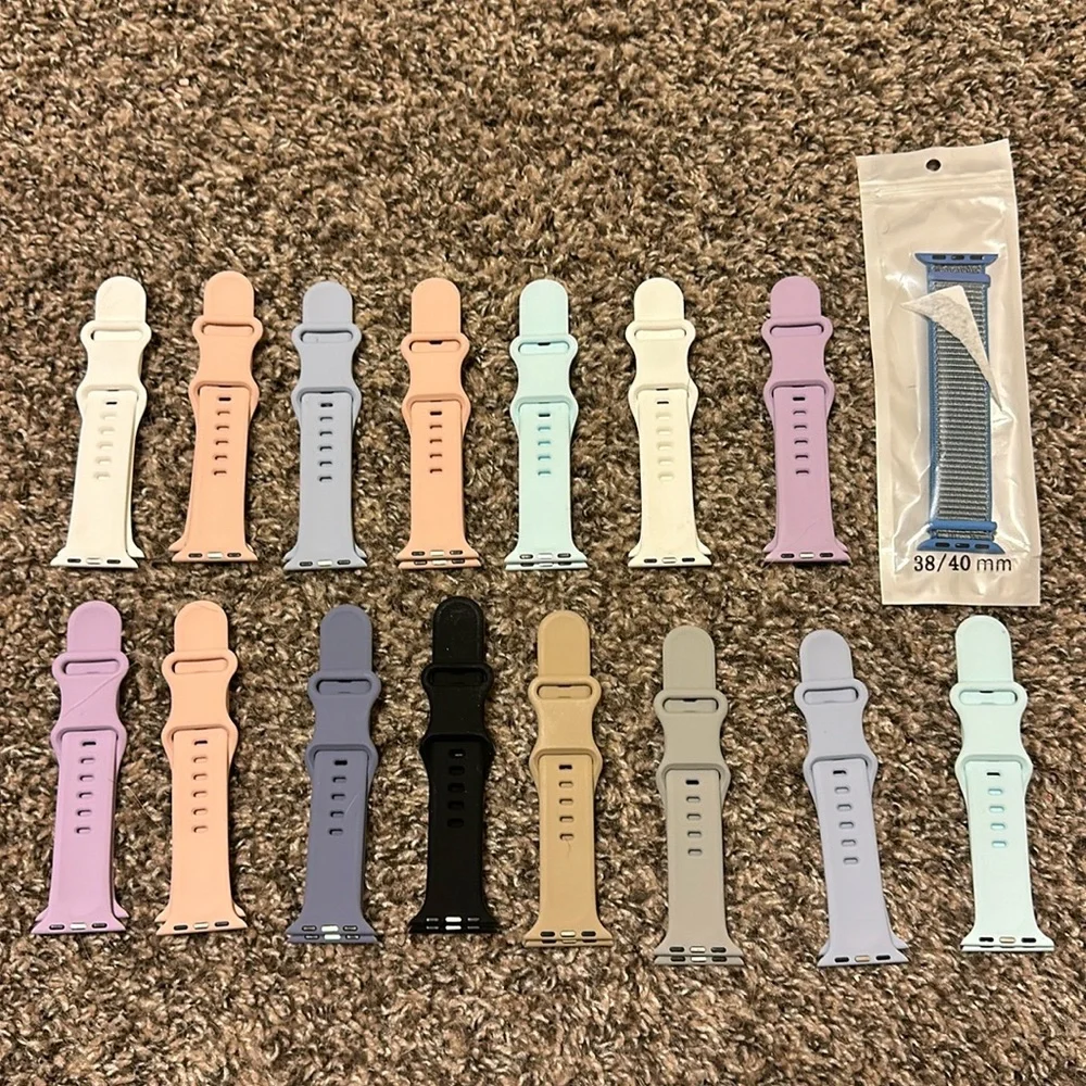14 Apple Watch bands with 12 watch cases. Bands are 38/40mm